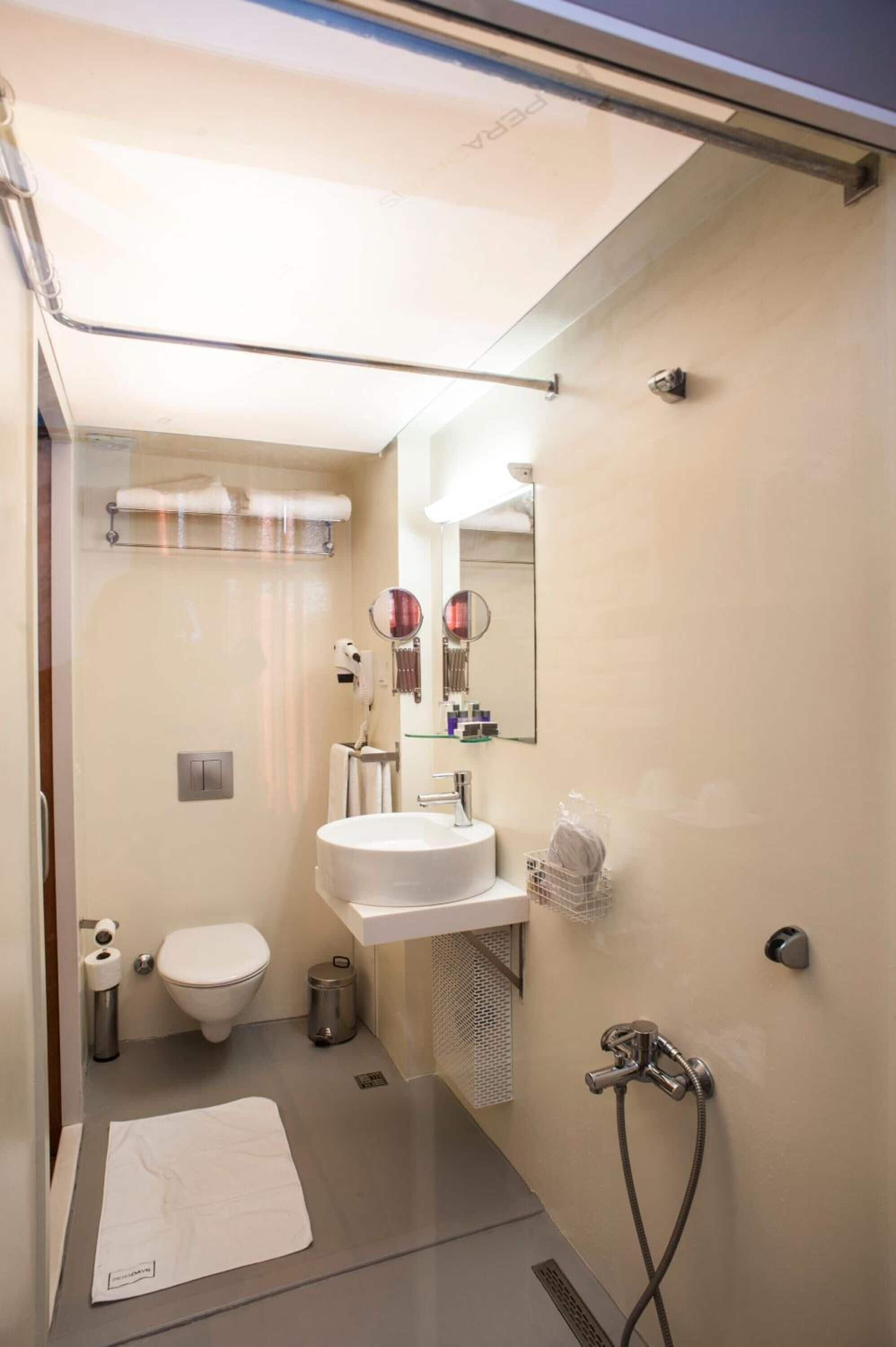 free toiletries, hair dryer, slippers, towels