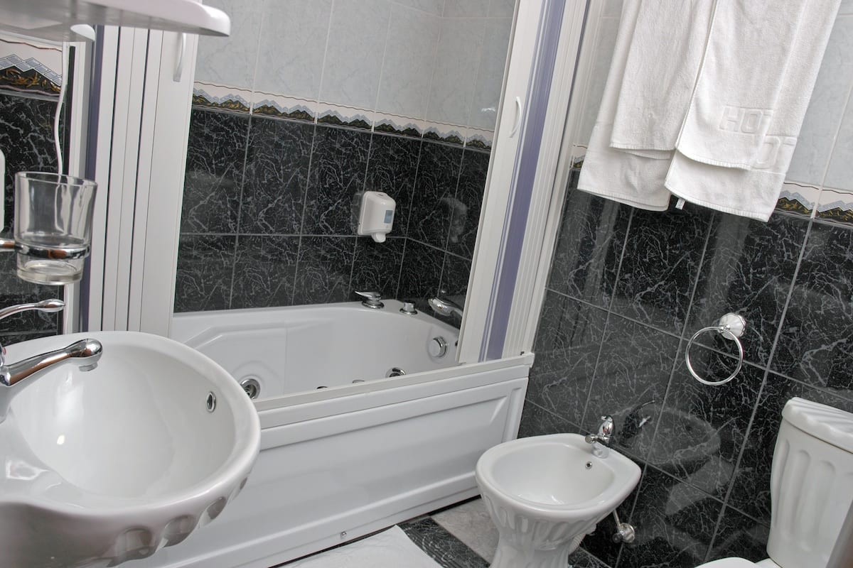 standard double room | bathroom | hair dryer, towels