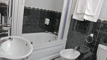 Standard Double Room | Bathroom | Hair dryer, towels