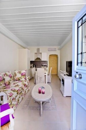 Villa, 2 Bedrooms | Living room | Flat-screen TV, DVD player