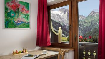 Deluxe Apartment, Kitchenette | Living room | 42-inch flat-screen TV with satellite channels, TV