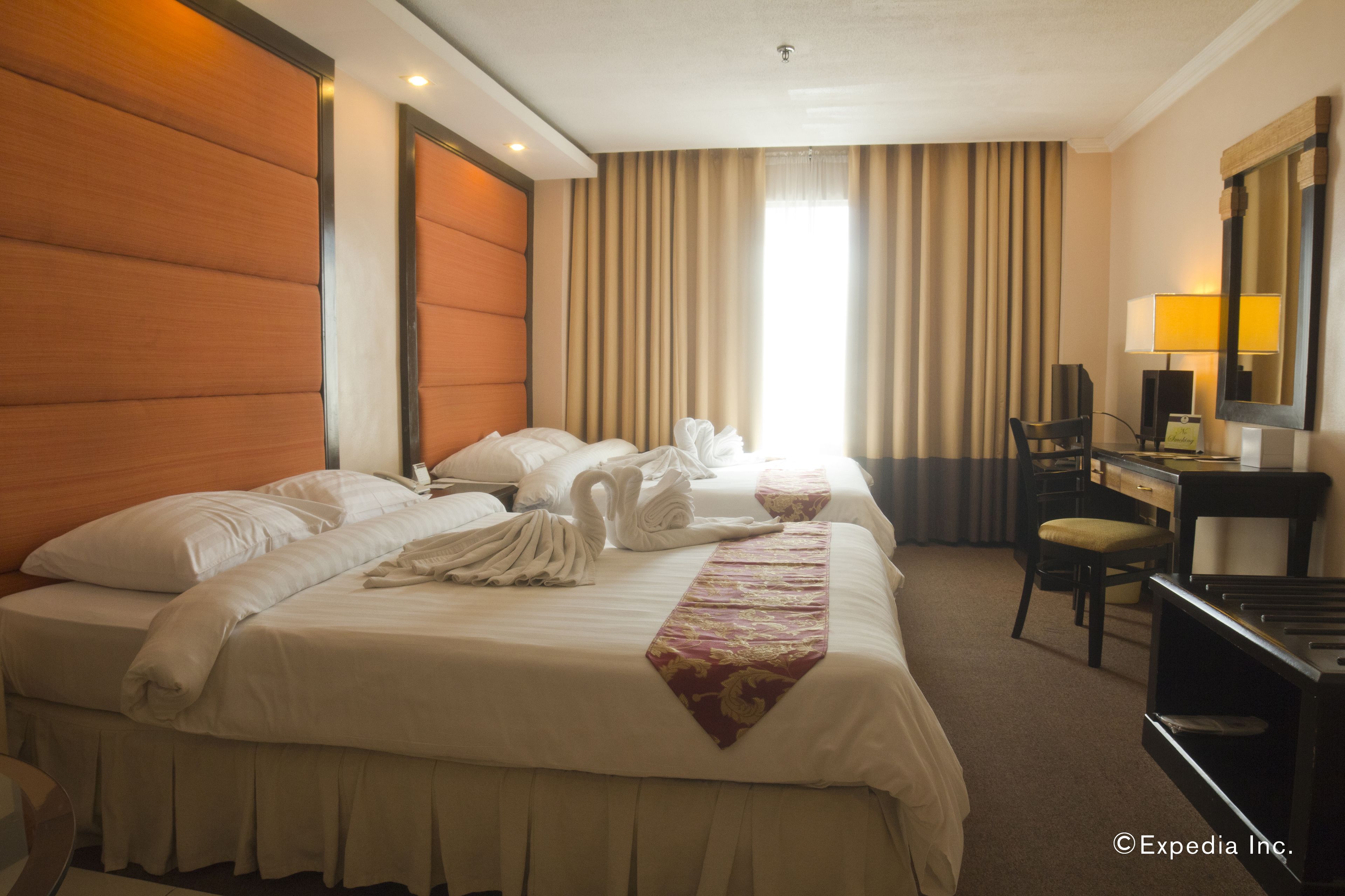 Memory-foam beds, minibar, in-room safe, desk