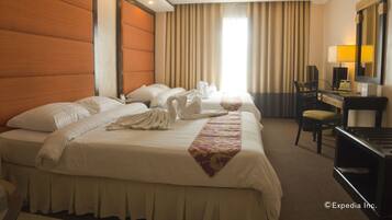 Memory-foam beds, minibar, in-room safe, desk