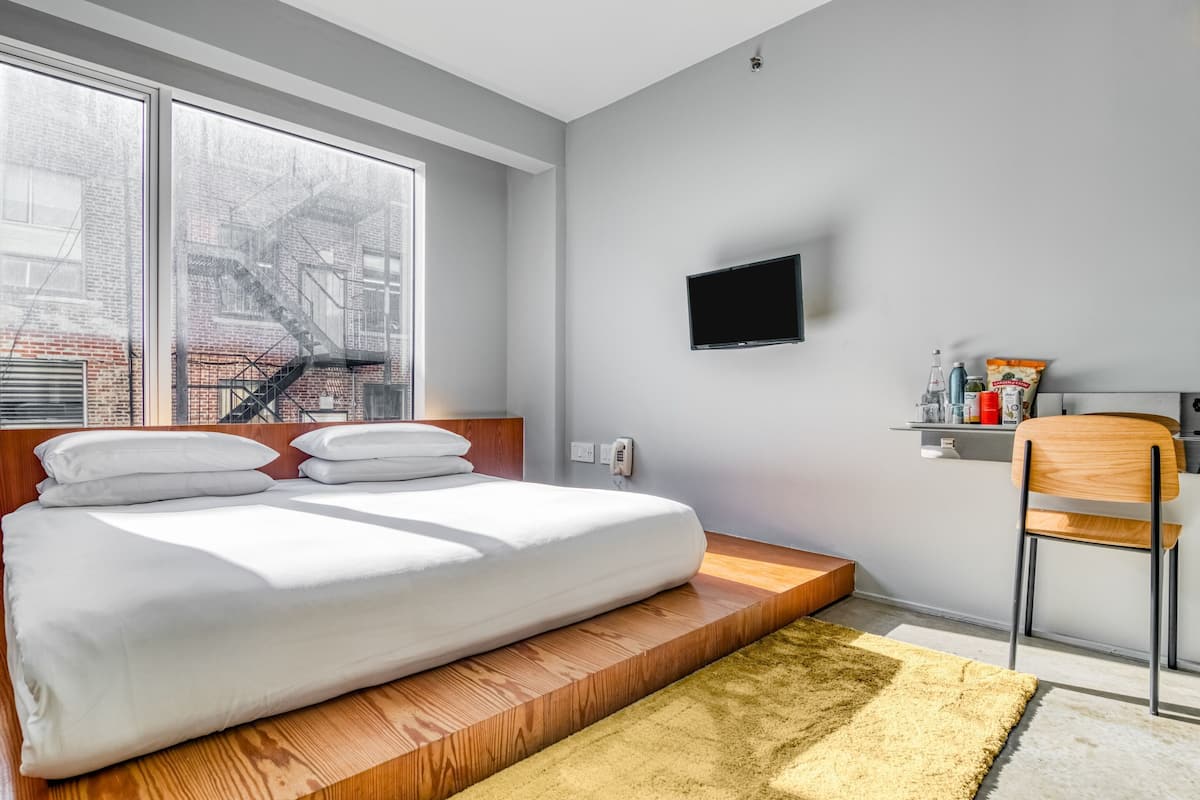 ห้องดีลักซ์ | 1 ห้องนอน, ตู้นิรภัยในห้องพัก, โต๊ะทำงาน, ผ้าม่านกันแสง