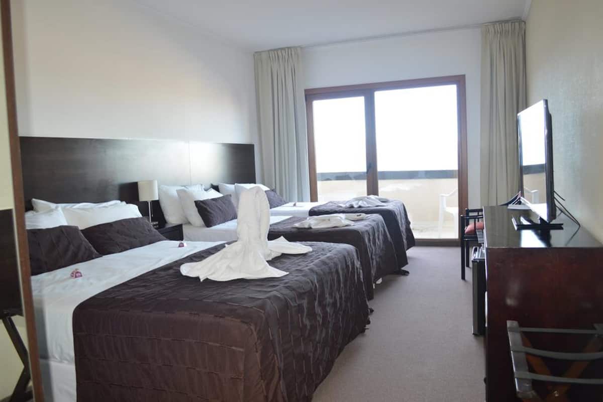Standard Quadruple Room, 1 Bedroom | In-room safe, free cots/infant beds, bed sheets