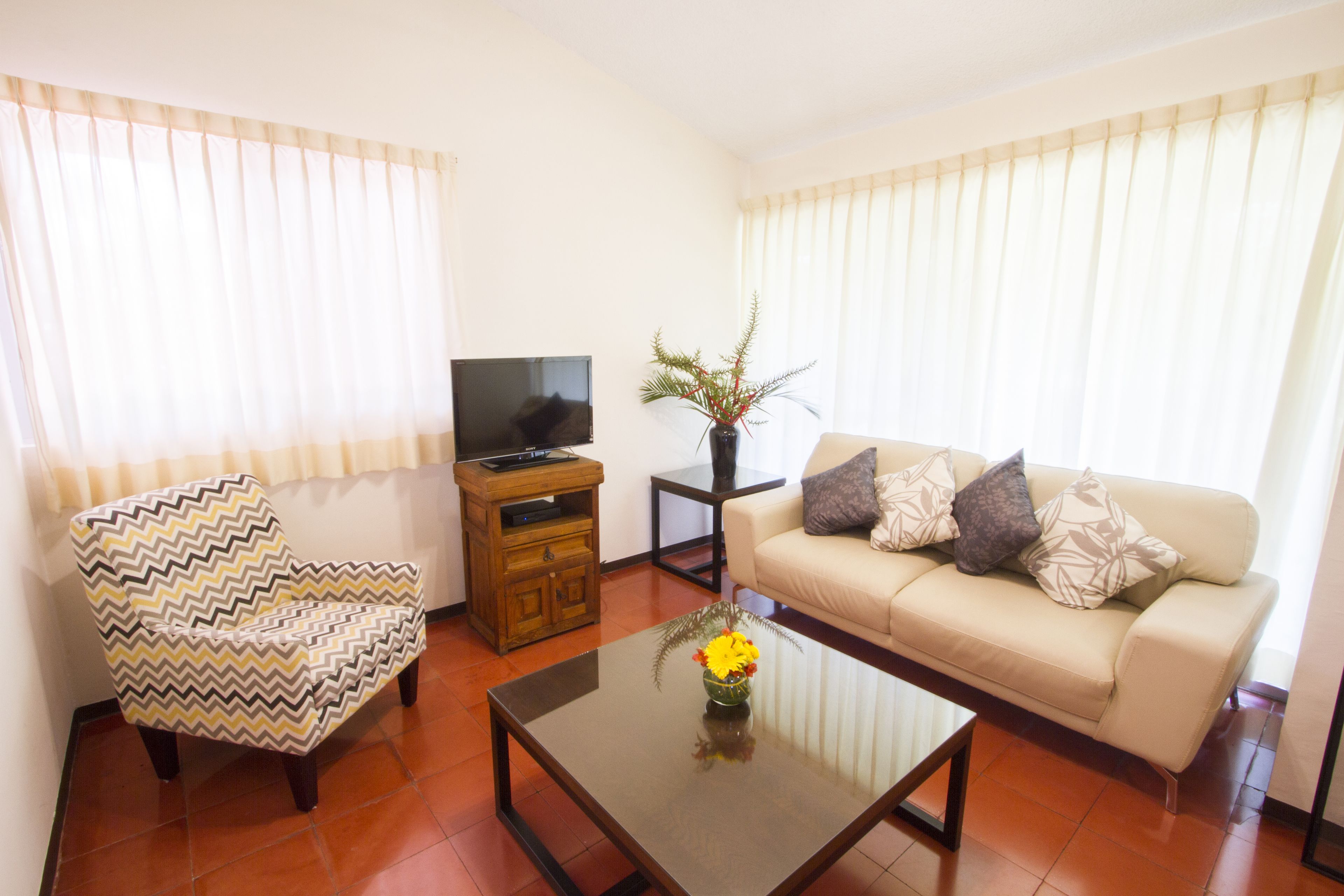 bungalow, 2 bedrooms | living room | 32-inch flat-screen tv with satellite channels, tv, pay films