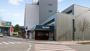 A modern building with a sign reading "Kyriad."