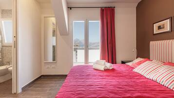Exclusive Suite | Premium bedding, in-room safe, blackout drapes, iron/ironing board