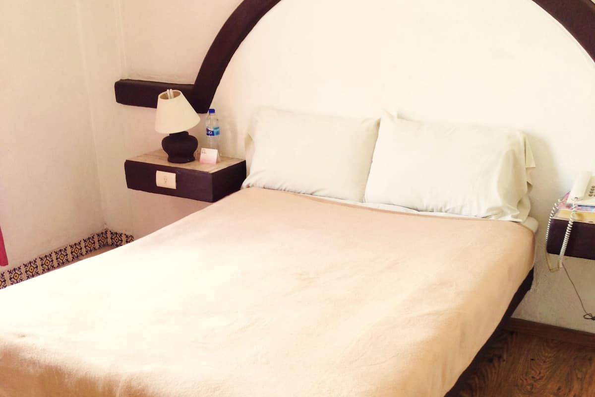 Blackout drapes, iron/ironing board, free WiFi, bed sheets