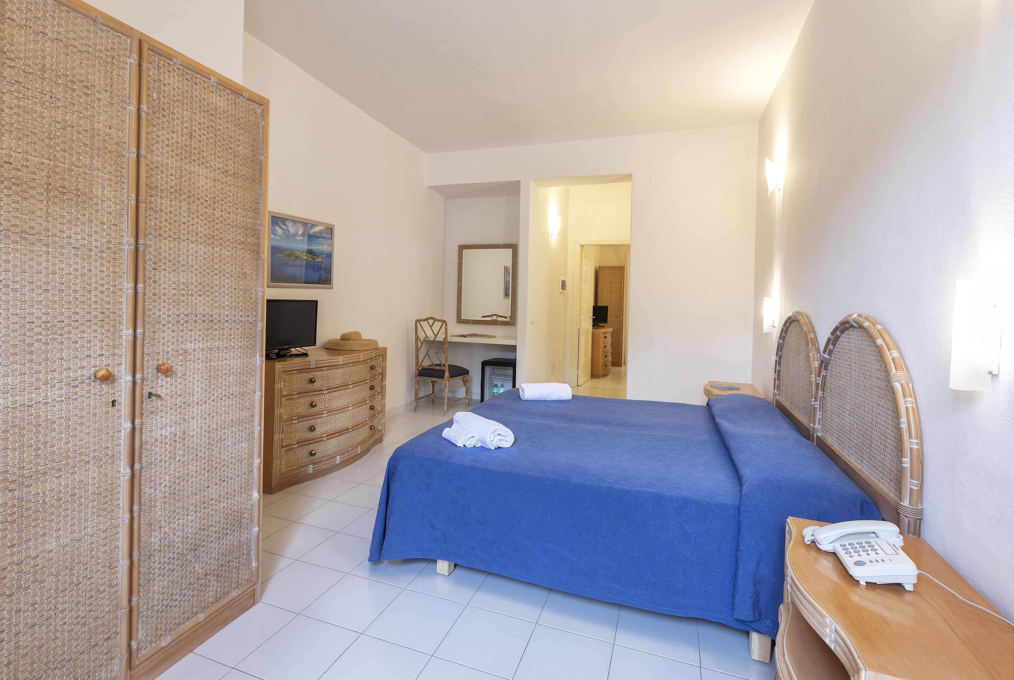 family room | 1 bedroom, minibar, in-room safe, individually decorated