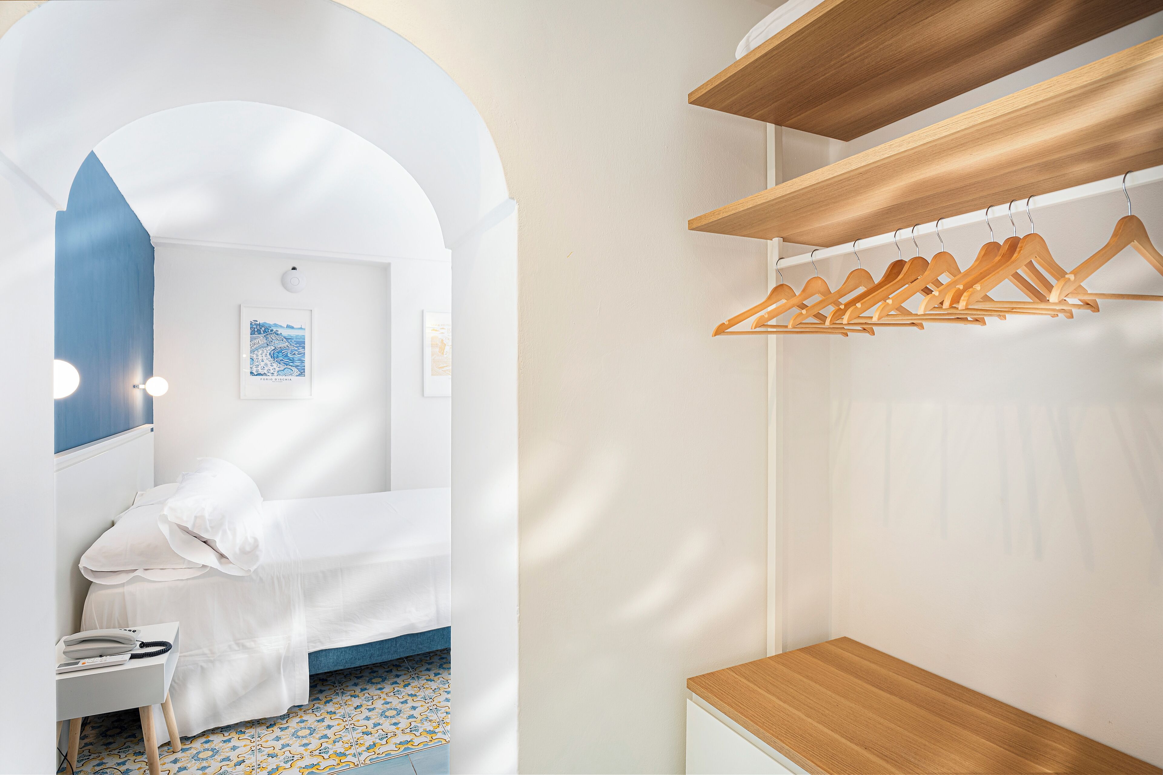 Triple Room | Minibar, in-room safe, individually decorated, individually furnished