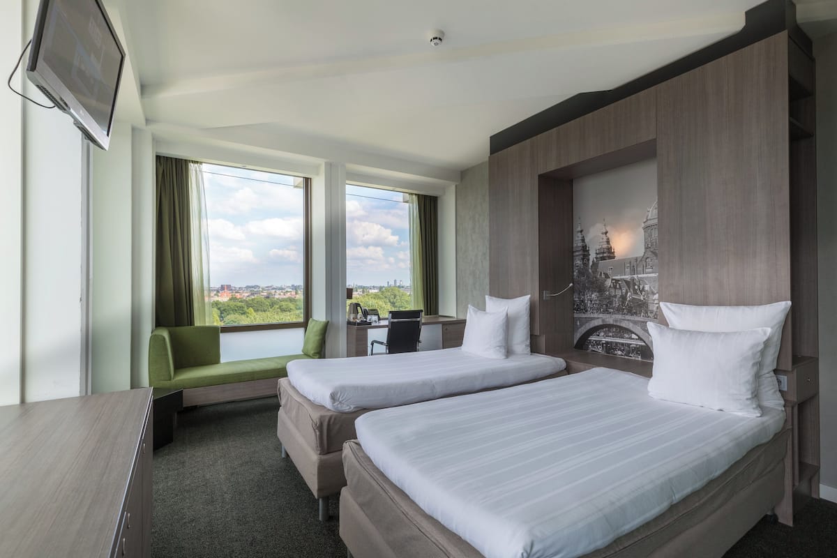 Habitación Confort (1 Twin Bed) | Colchones con acolchado adicional, caja fuerte, escritorio