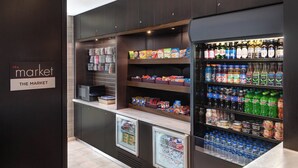 A self-service beverage station with refrigerated drinks and snacks. - Courtyard by Marriott Pittsburgh Washington/Meadow Lands (Washington)