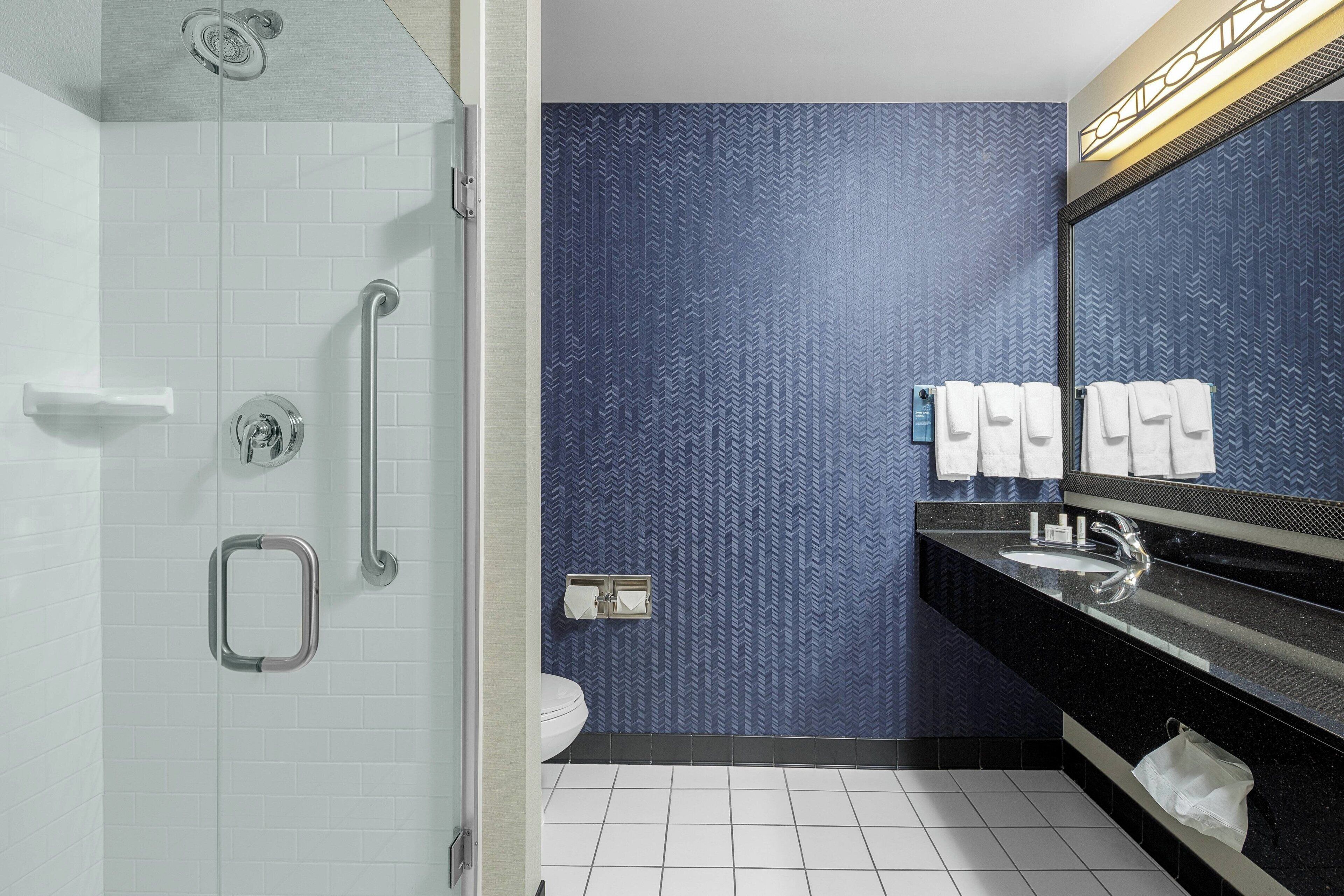 combined shower/bathtub, free toiletries, hair dryer, towels