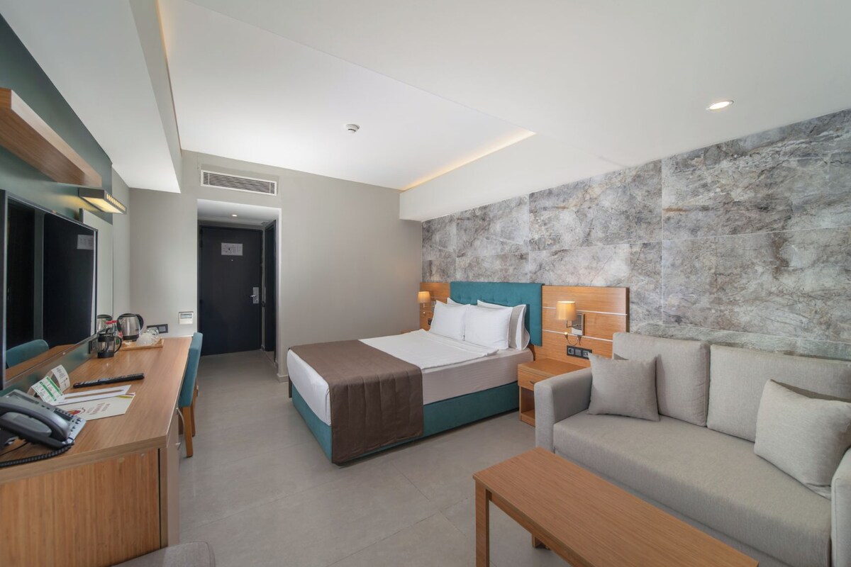 Chambre Standard | Literie de qualité, minibar, coffre-fort pour ordinateur portable