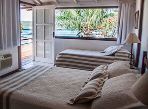 Panoramic Triple Room, Terrace | Minibar, in-room safe, blackout drapes, bed sheets - Pousada Baia Bonita (Búzios)