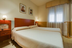 Habitación con 1 cama doble o 2 individuales | Colchones Select Comfort, camas supletorias, wifi gratis