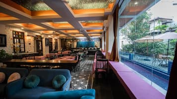Breakfast, lunch, dinner served; international cuisine, pool views