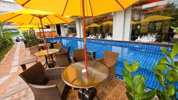 Breakfast, lunch, dinner served; international cuisine, pool views