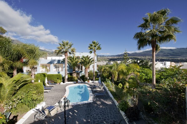 Outdoor pool, pool umbrellas, pool loungers