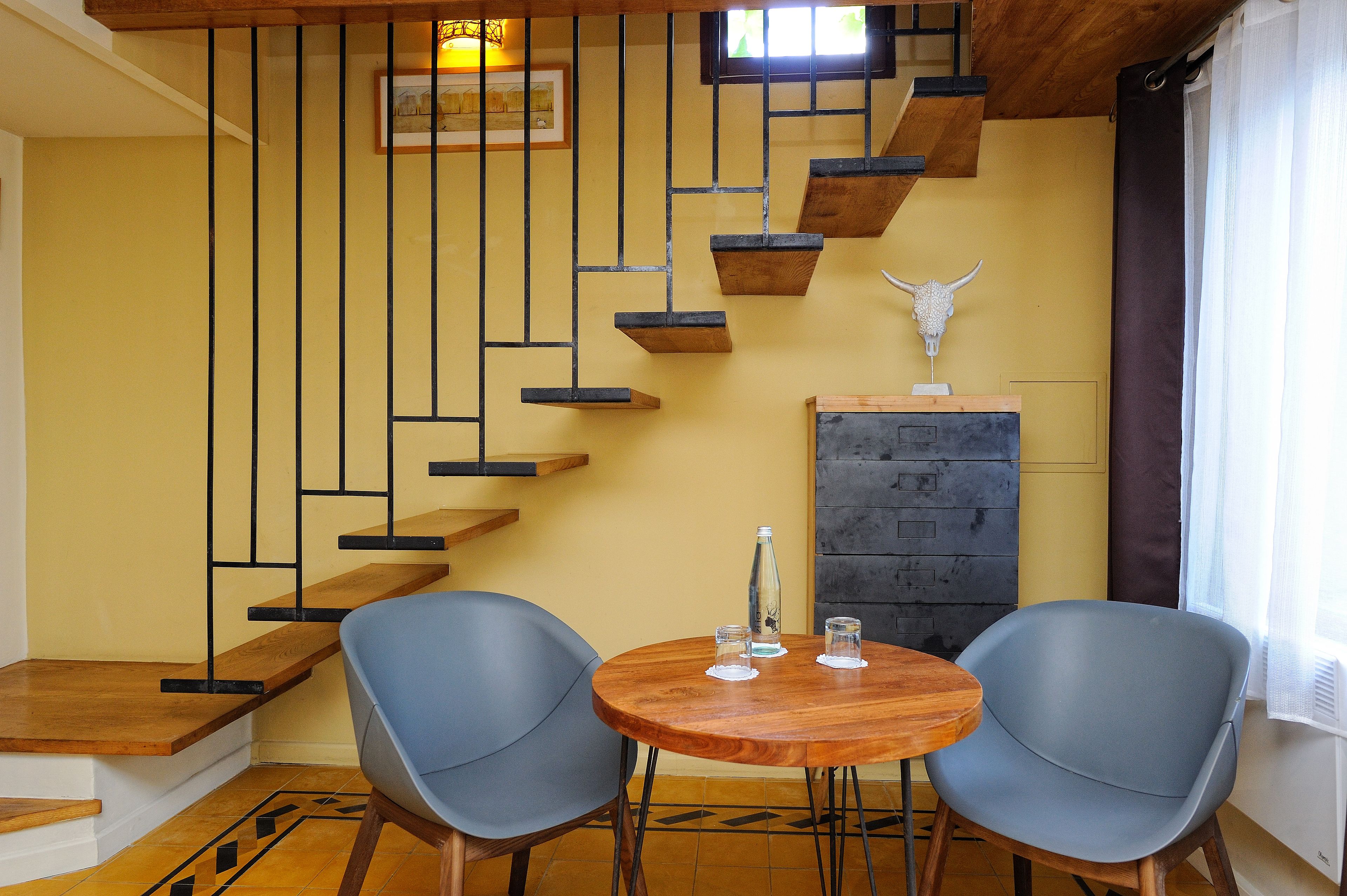 suite, garden view | premium bedding, minibar, in-room safe, individually decorated