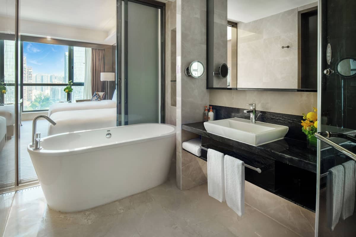 Hair dryer, bathrobes, slippers, towels