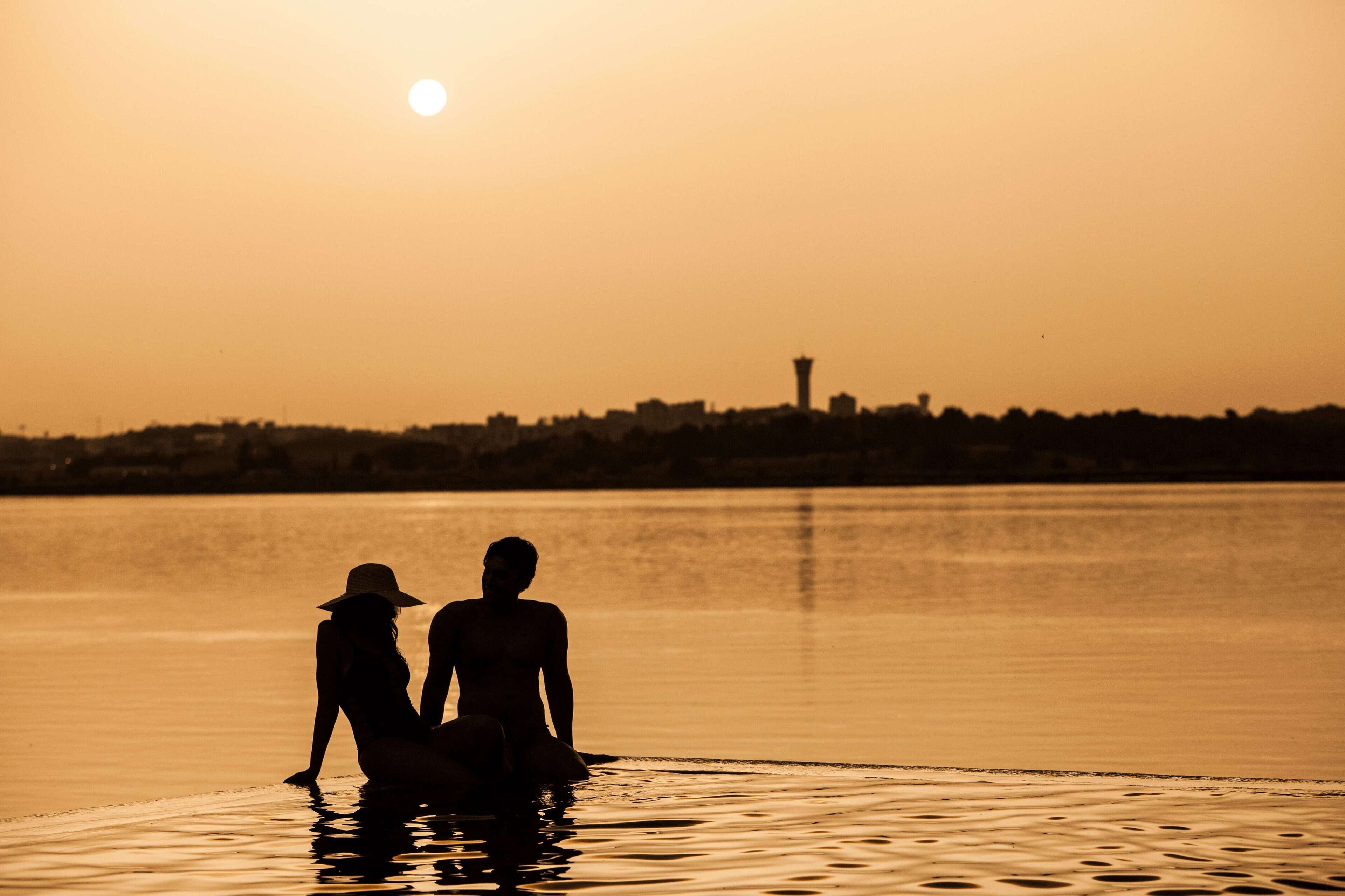 indoor pool, outdoor pool, open 10:00 am to 7:00 pm, pool umbrellas