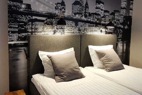 Premium bedding, down comforters, pillowtop beds, blackout drapes