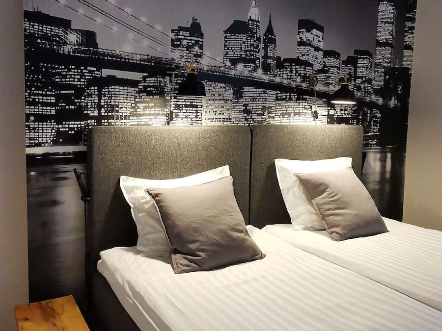 Premium bedding, down comforters, pillowtop beds, individually decorated