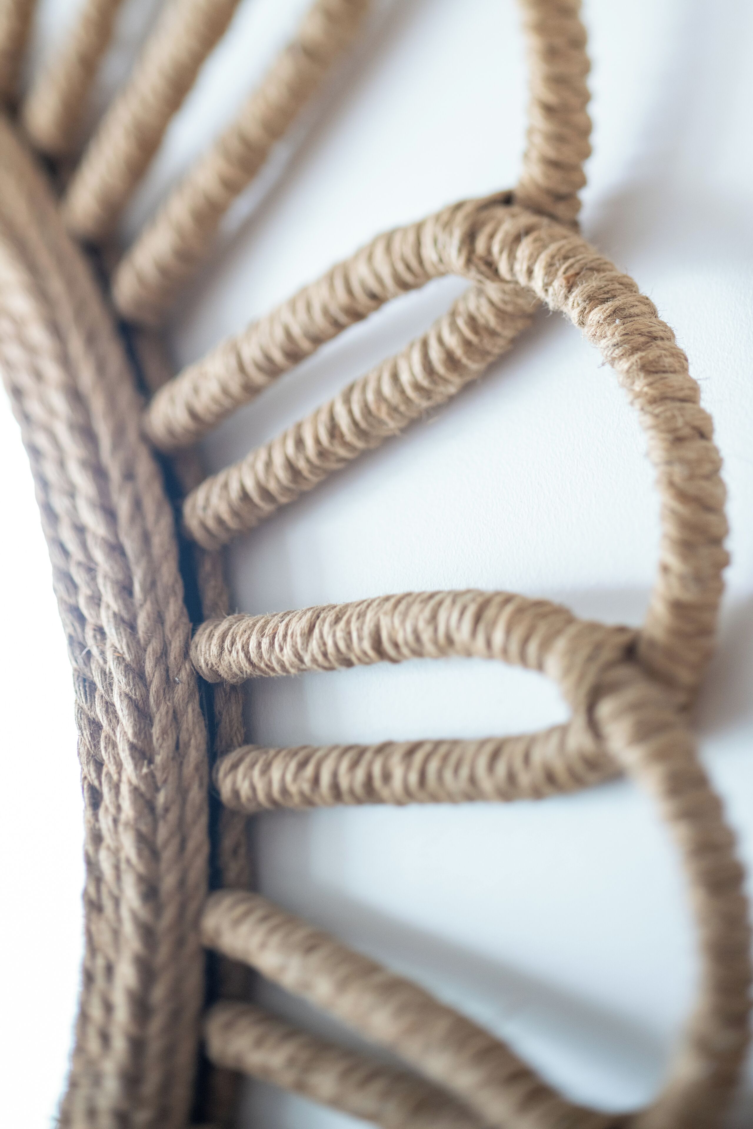 A close-up of a rope with a textured surface.