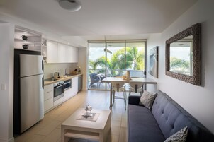 Apartamento, 1 cama Queen | Vista do quarto