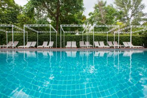 Outdoor pool, open 8 AM to 9:00 PM, pool umbrellas, sun loungers