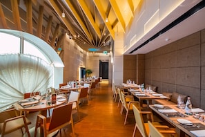 Breakfast, lunch, dinner served; international cuisine, pool views