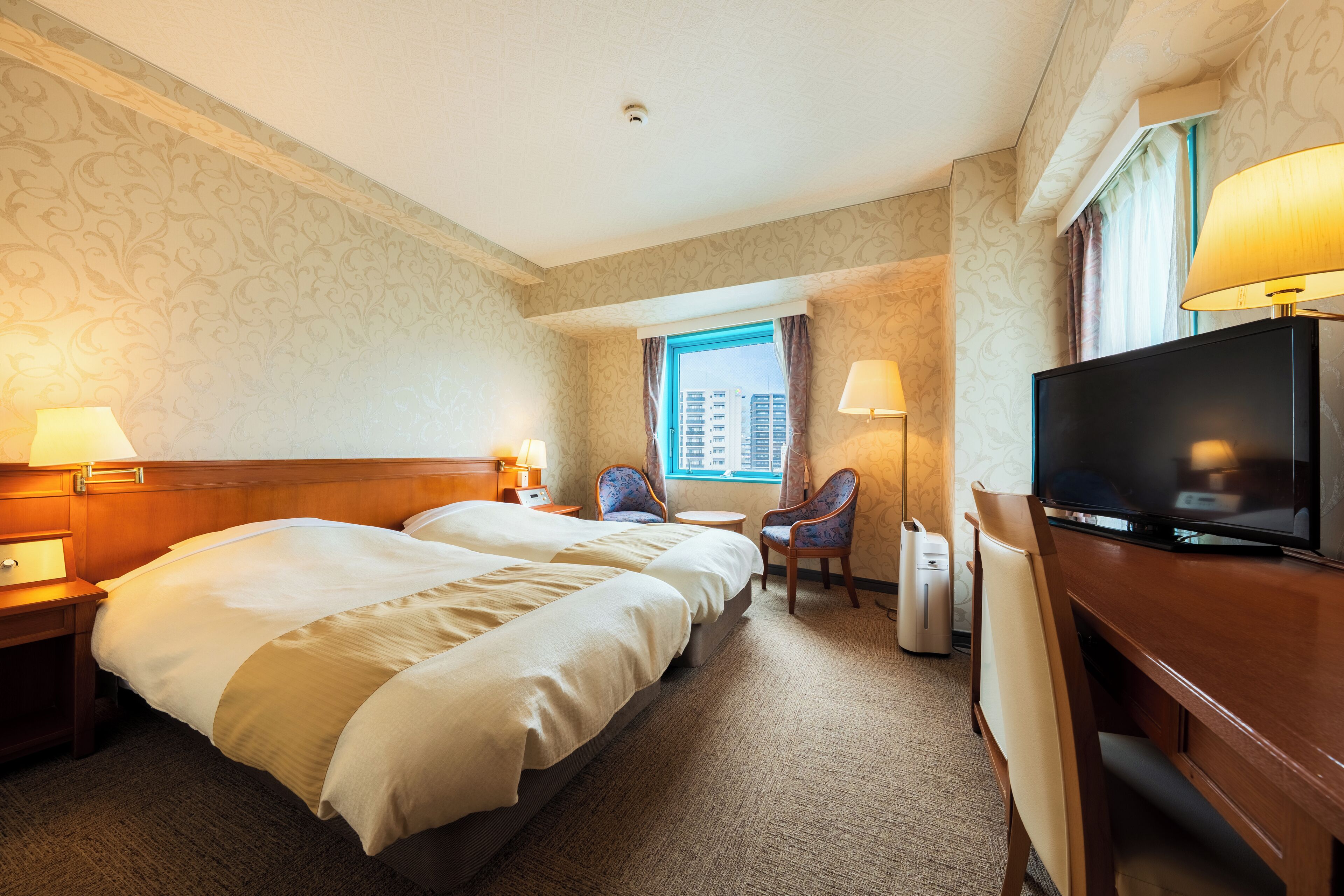 Desk, laptop workspace, free WiFi, bed sheets