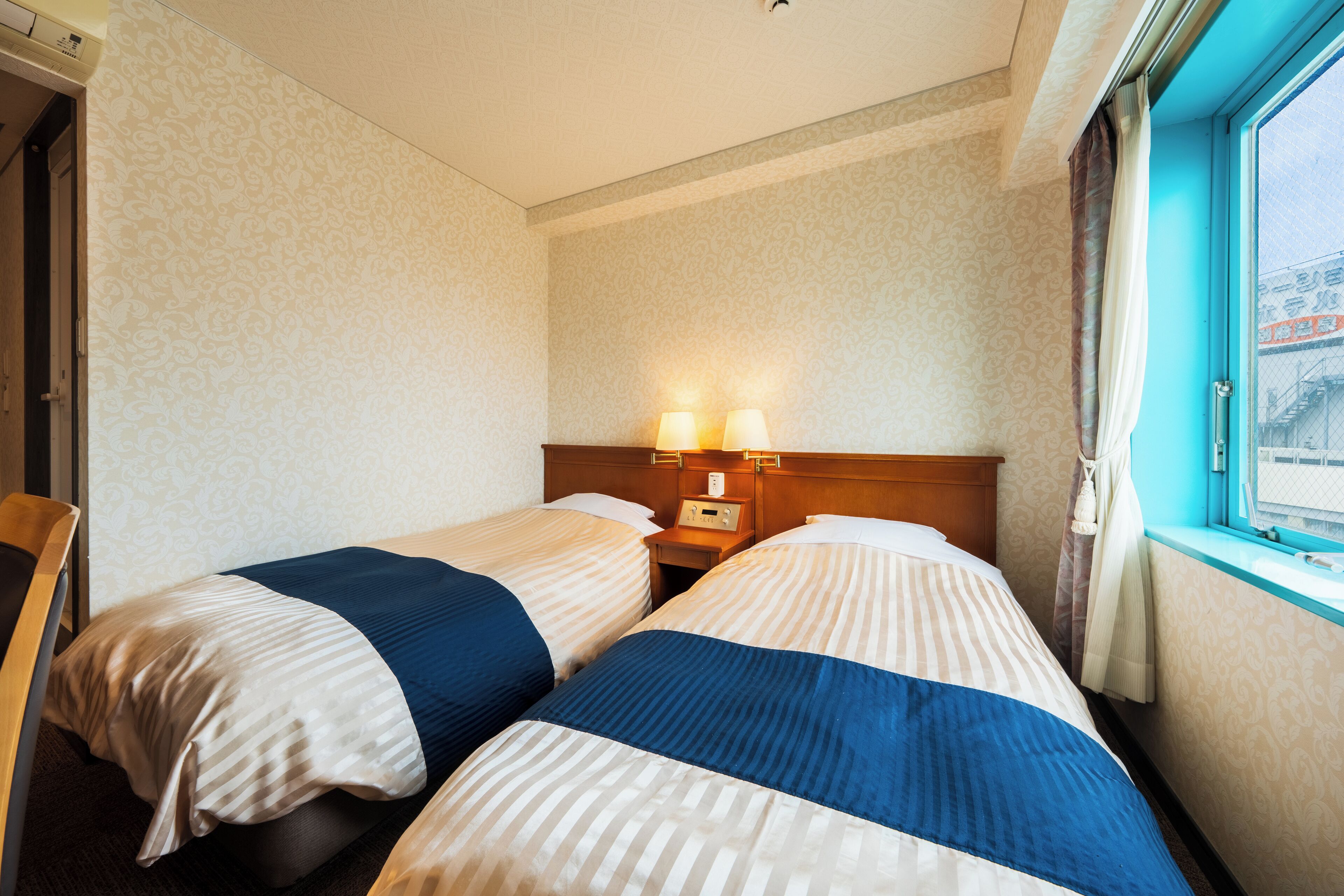 Desk, laptop workspace, free WiFi, bed sheets