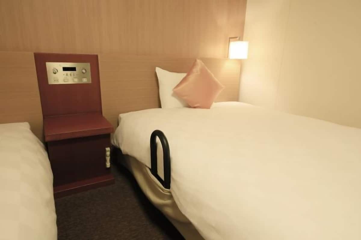 Down comforters, blackout drapes, iron/ironing board, bed sheets