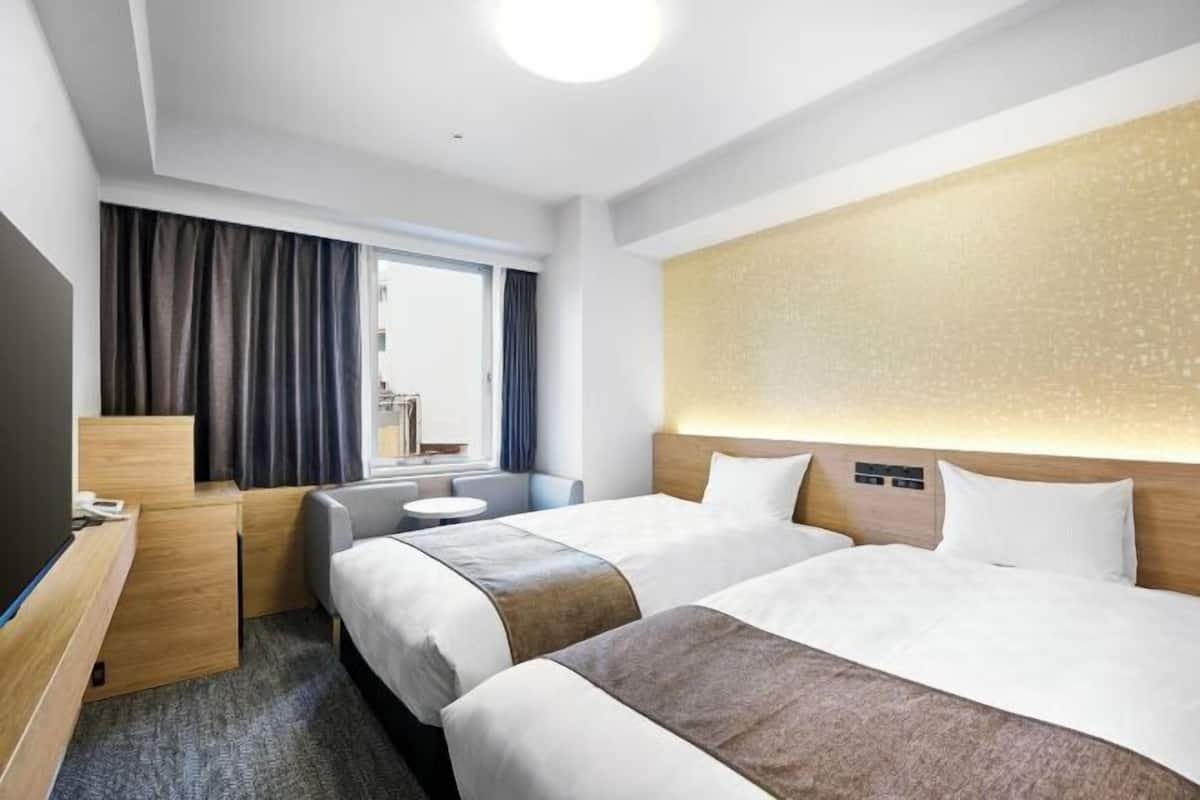 Down comforters, blackout drapes, iron/ironing board, bed sheets