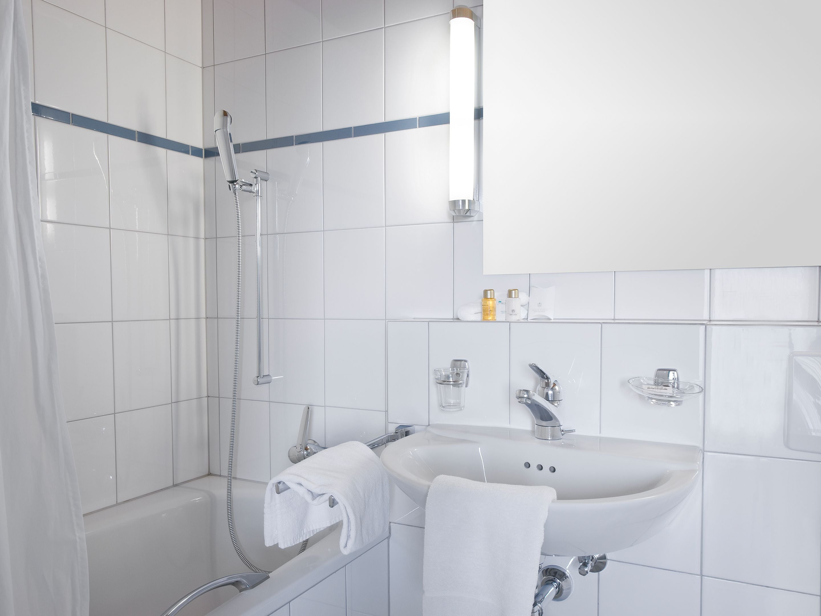 comfort single room | bathroom | hair dryer, towels