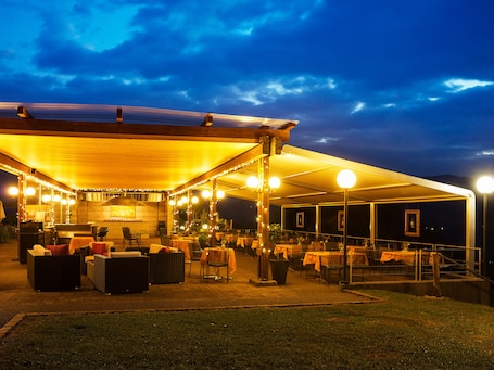 Breakfast, lunch, dinner served; Mediterranean cuisine, garden views