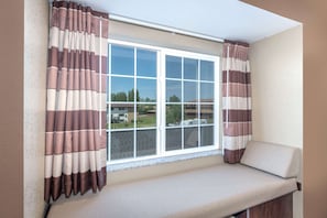 Desk, laptop workspace, blackout curtains, iron/ironing board