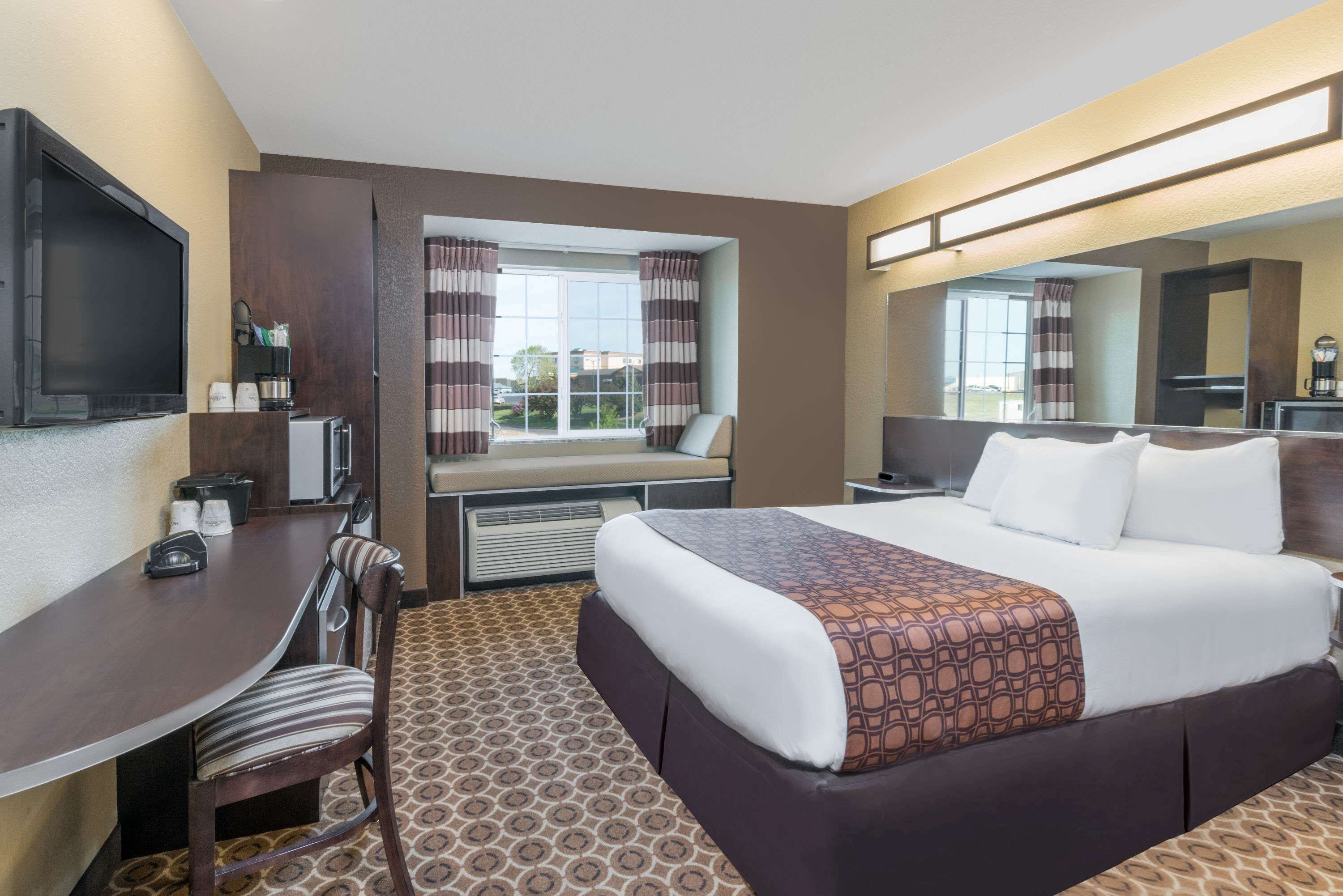 desk, laptop workspace, blackout curtains, iron/ironing board