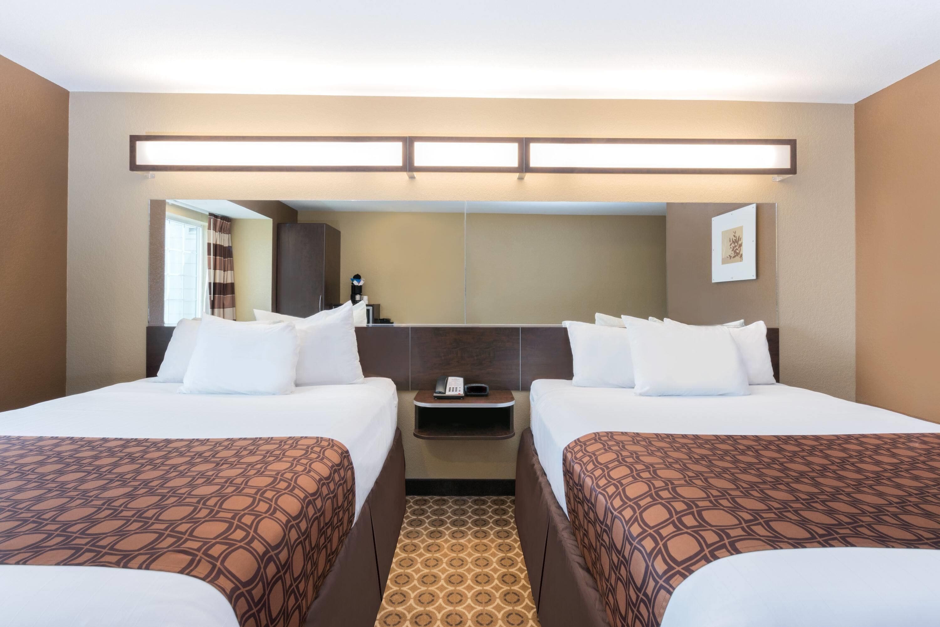 desk, laptop workspace, blackout curtains, iron/ironing board