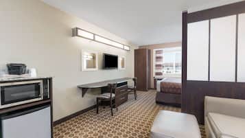 Desk, laptop workspace, blackout drapes, iron/ironing board