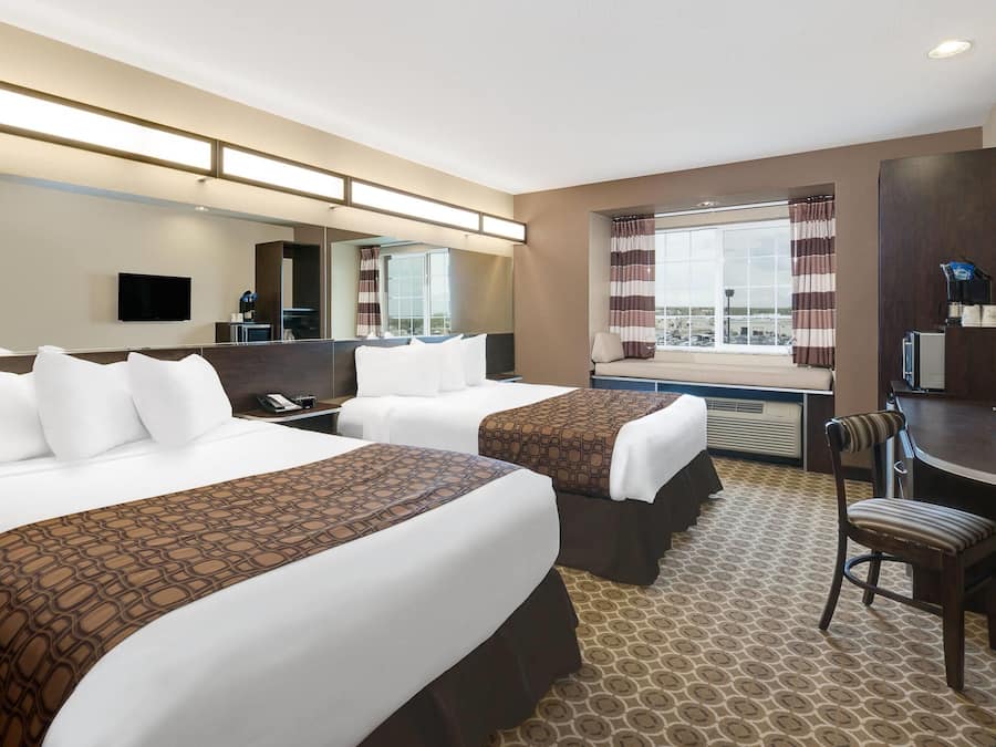 Room, 2 Queen Beds, Non Smoking | In-room safe, desk, iron/ironing board, free WiFi