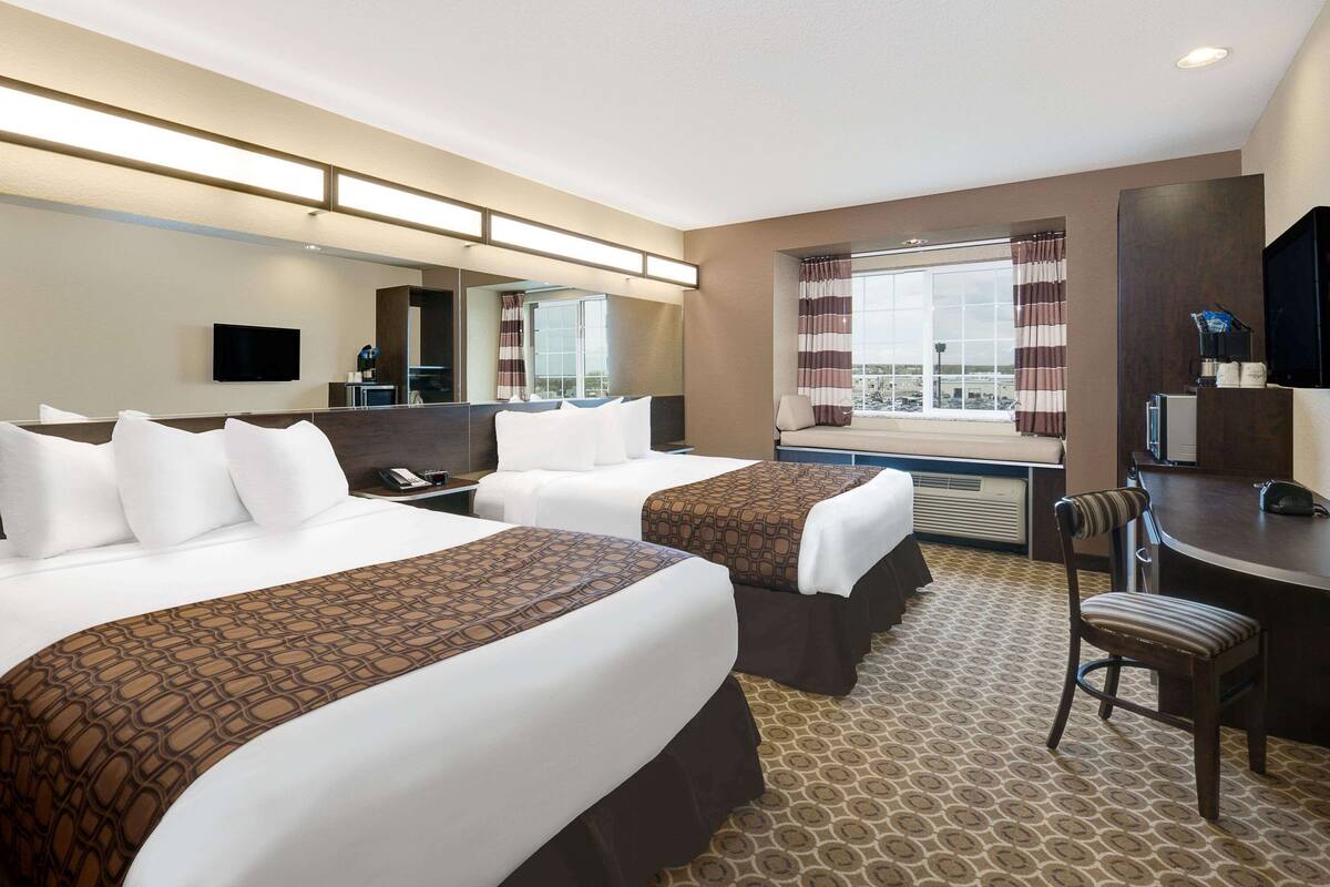 room, 2 queen beds, non smoking | in-room safe, desk, iron/ironing board, free wifi