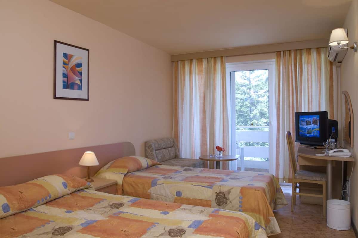 Blackout drapes, WiFi (free), bed sheets