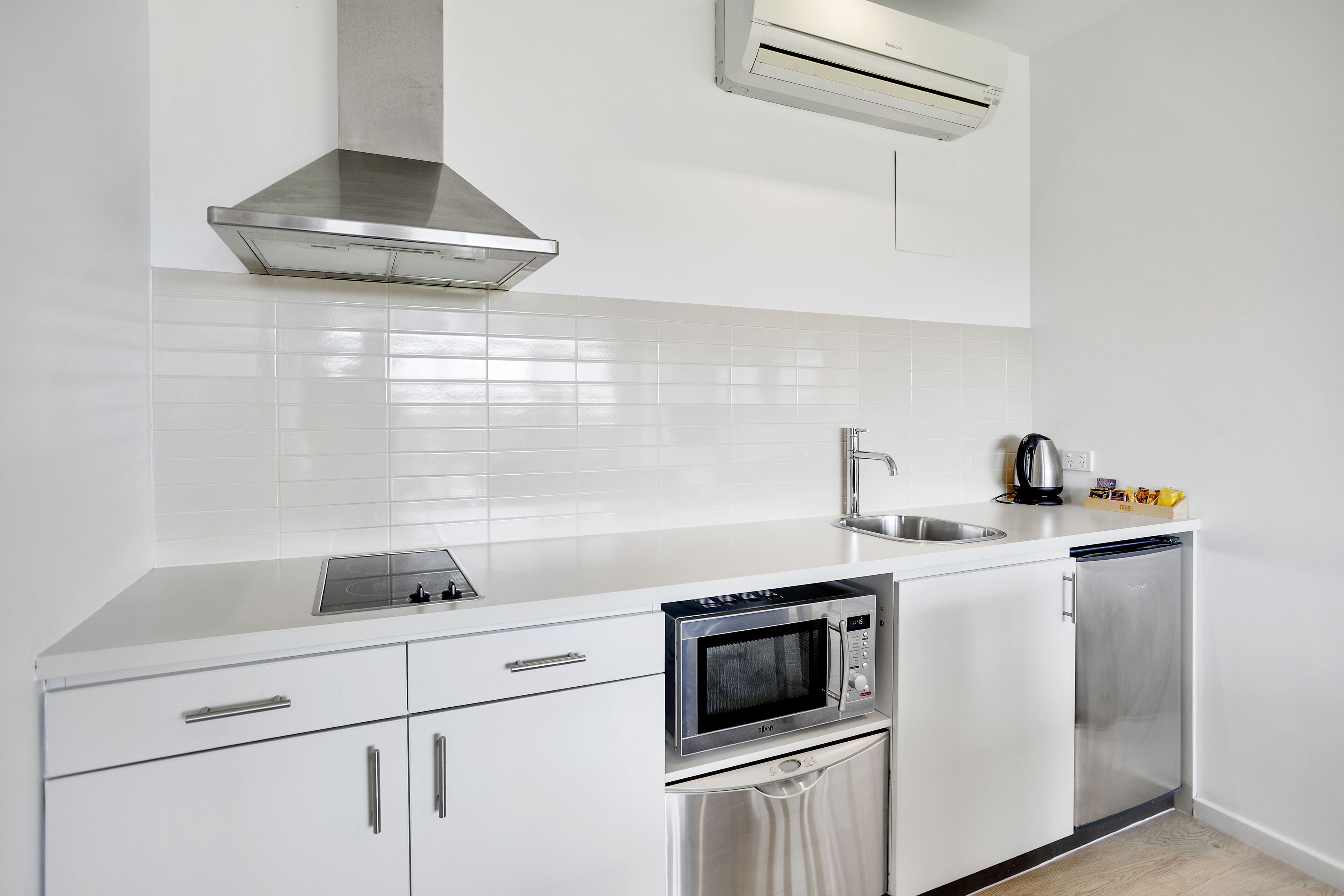 one bedroom suite | private kitchen | fridge, electric kettle, cookware/dishes/utensils