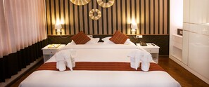Minibar, coffres-forts dans les chambres, rideaux occultants