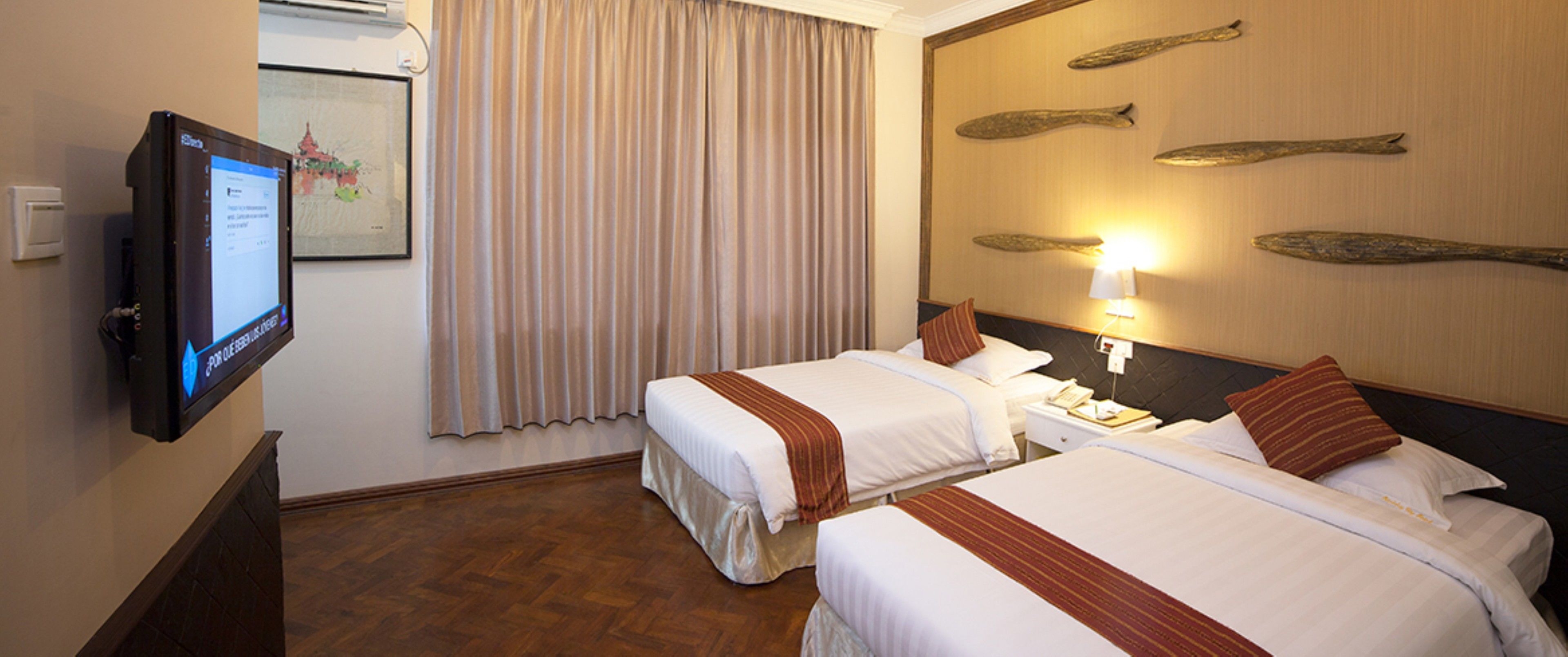 superior room | minibar, in-room safe, blackout curtains, iron/ironing board
