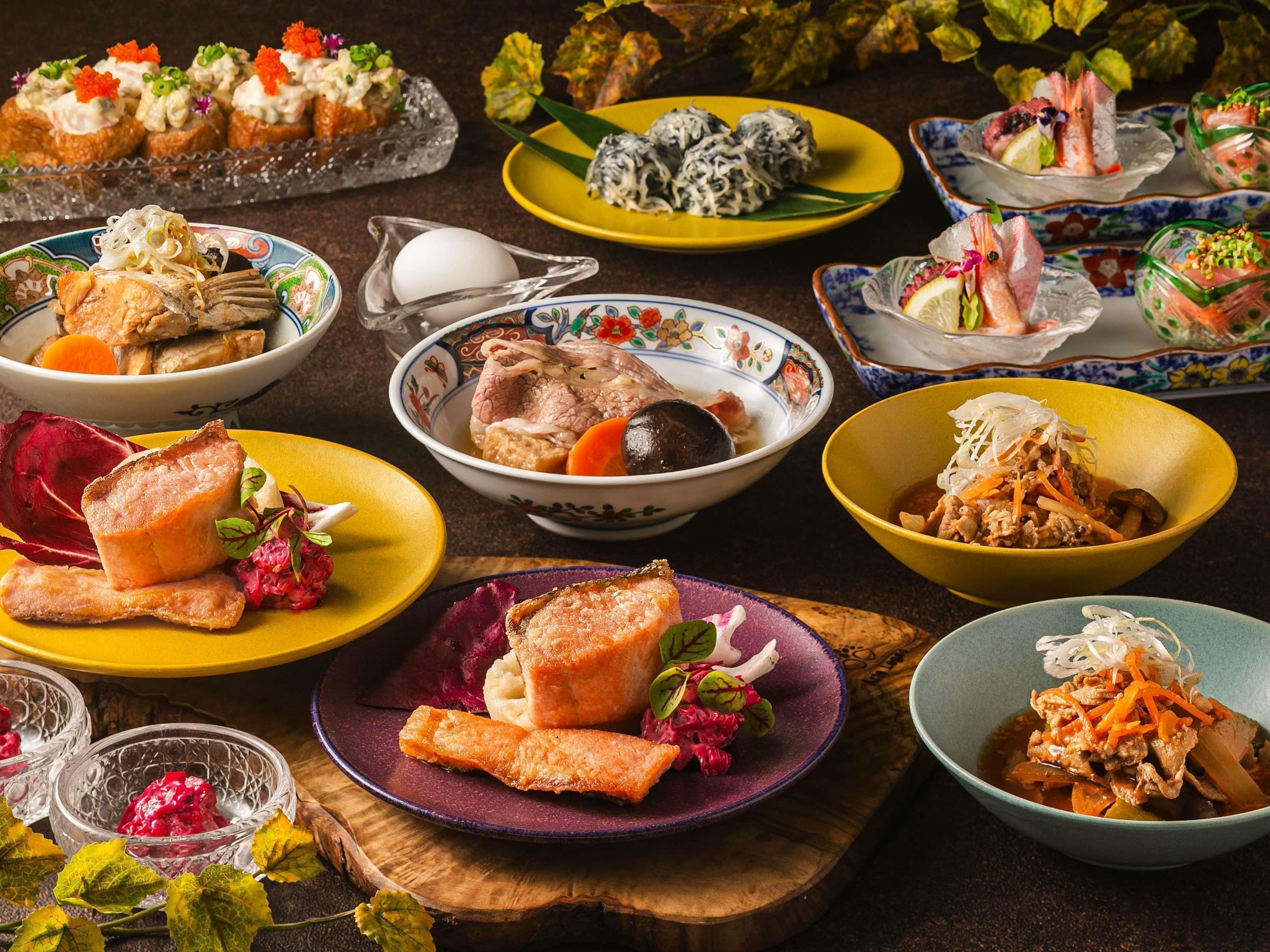 A variety of dishes on a table, including meat, vegetables, and seafood.